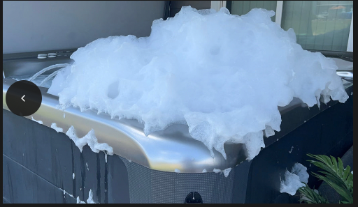 picture of a hot tub with a large amount of foam from the hot tub scrub